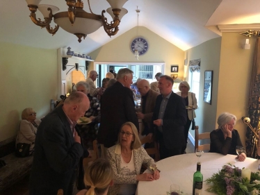 Members enjoy the Spring Supper party at the home of Louise and Gordon Thistlethwaite